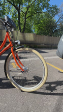 Load and play video in Gallery viewer, The Electrified Swytch Go Dutch Orange Oma - Step Through Style Dutch Bike - Small Medium- Orange
